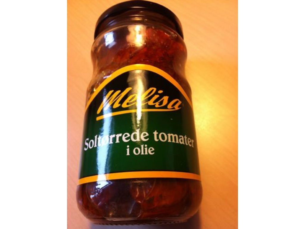 Soltørrede tomater i olie på glas